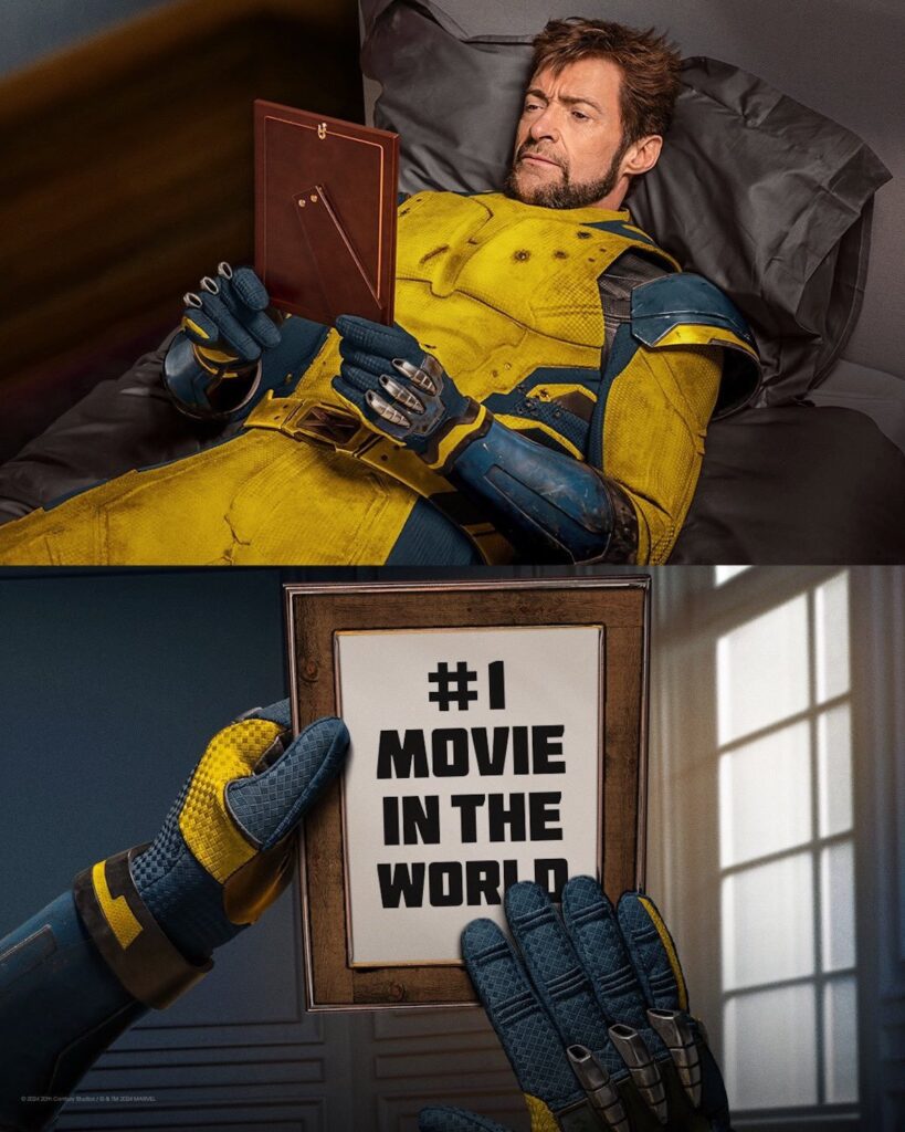 Hugh Jackman in his yellow and blue costume recreating the sad Wolverine meme lying in bed looking at a photo split on the bottom with the photo revealing the film is the #1 movie in the world