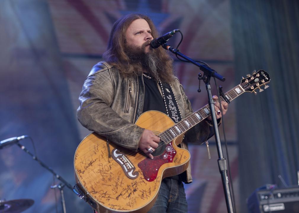Jamey Johnson performs onstage during the Farm Aid benefit concert.