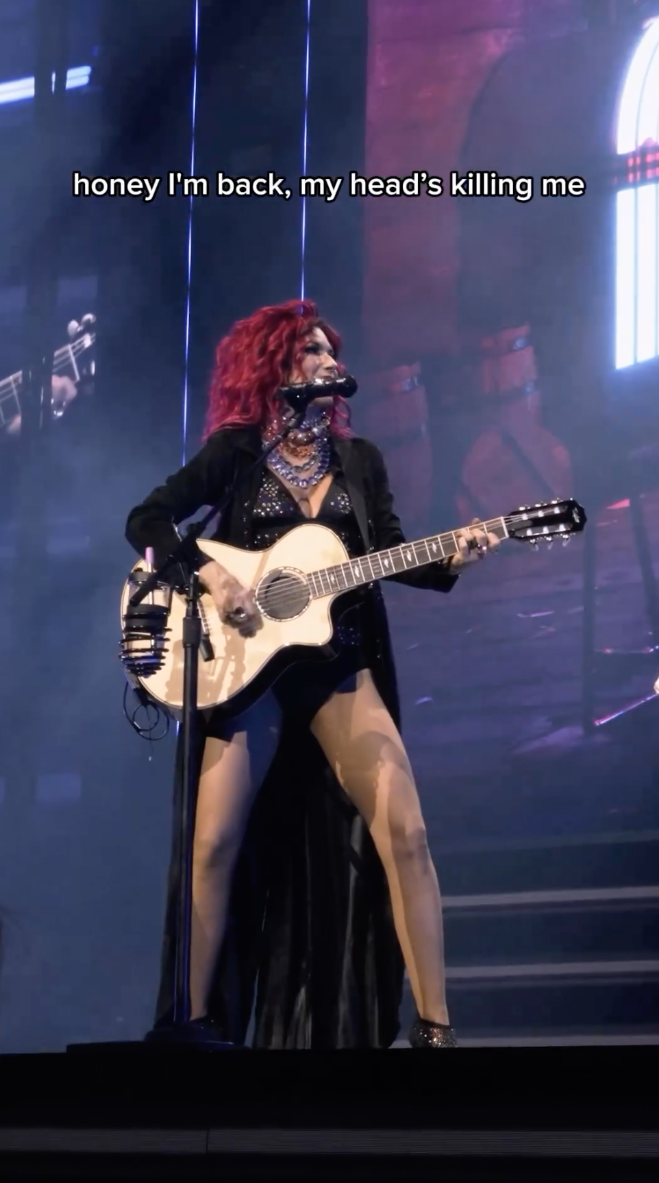 Shania Twain donning a black ensemble while performing her hit track Honey, I'm Home