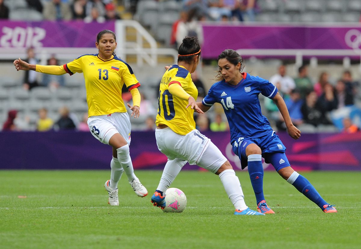 France's Louisa Necib (right) and Colombia's Catalina Usme battle for the ball during the France v Colombia, Women's Football Group G match at St James' Park, Newcastle during day four of the London 2012 Olympics.   (Photo by EMPICS Sport - PA Images via Getty Images)