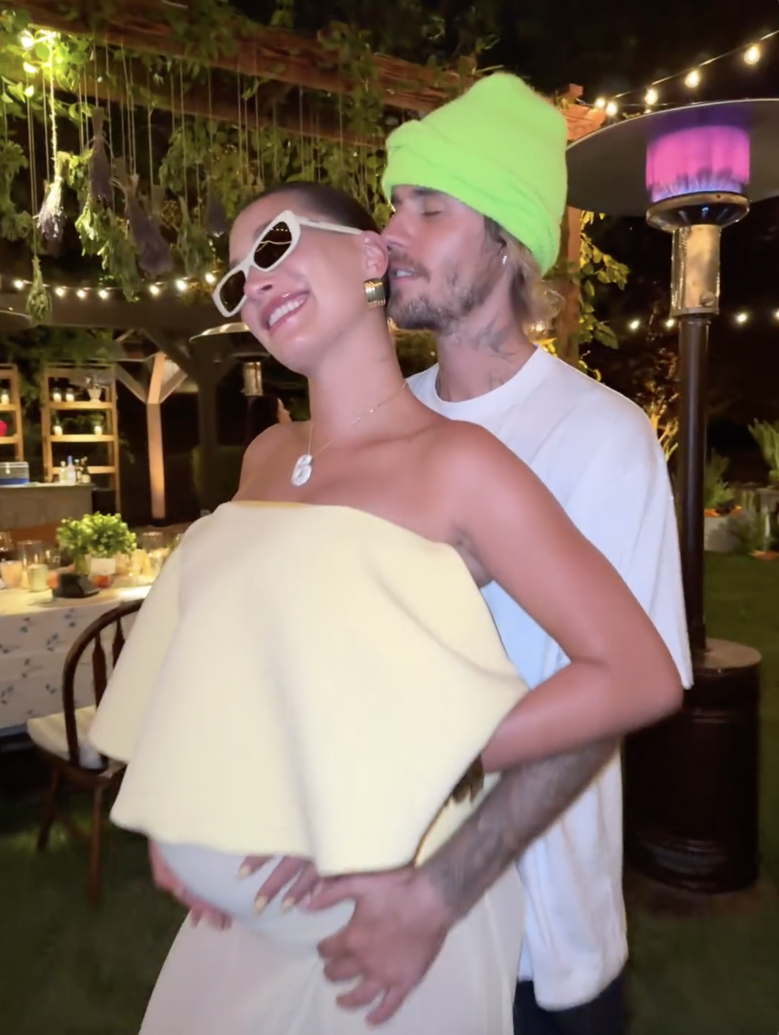 Hailey Bieber rubbed her baby bump as Justin held her in a video taken at the baby shower