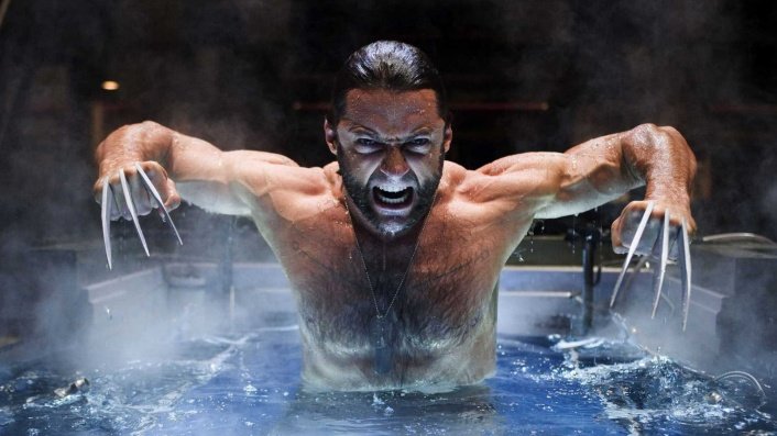 wolverine comes out of water with his claws drawn in x-men origins