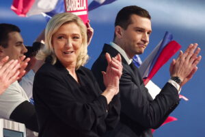 President of the far-right National Rally (Rassemblement National, or RN) party Jordan Bardella and Marine Le Pen, who calls him 'the lion's cub'
