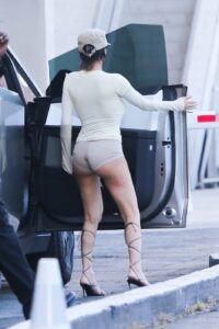 Bianca Censori getting out of her husband Kanye West's Cybertruck while going to the movies in Los Angeles, California