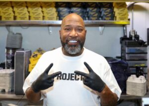 Bun B poses at Anthony Anderson & Cedric The Entertainer Meet And Greet At Trill Burgers
