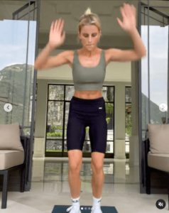 Caroline Daur in Two-Piece Workout Gear Laces Up