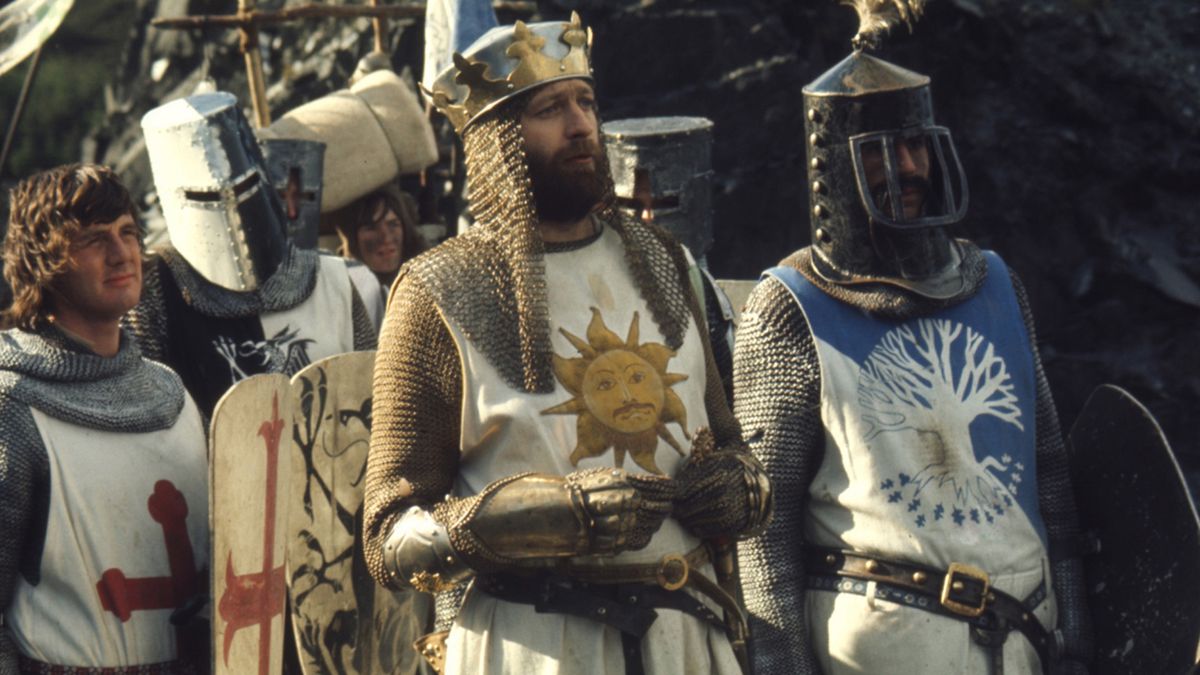 King Arthur (Graham Chapman), surrounded by his knights, in Monty Python and the Holy Grail.
