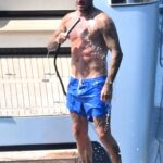 David Beckham proudly displayed his toned body as she stripped off for a shower on his £16m superyacht