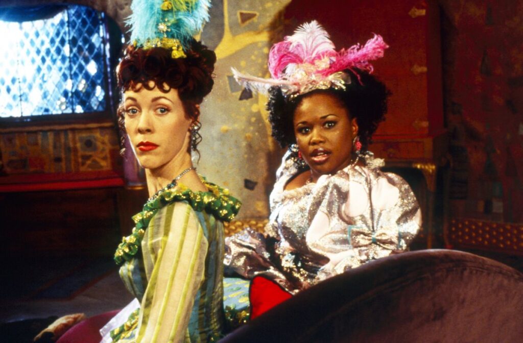 The Cinderella stepsisters in gaudy costumes