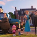 Gru and family standing outside a car, looking up at their new safe house