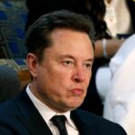 Tesla CEO Elon Musk listens to Israeli Prime Minister Benjamin Netanyahu