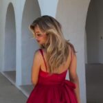Laura Celia Valk stunned in a red dress