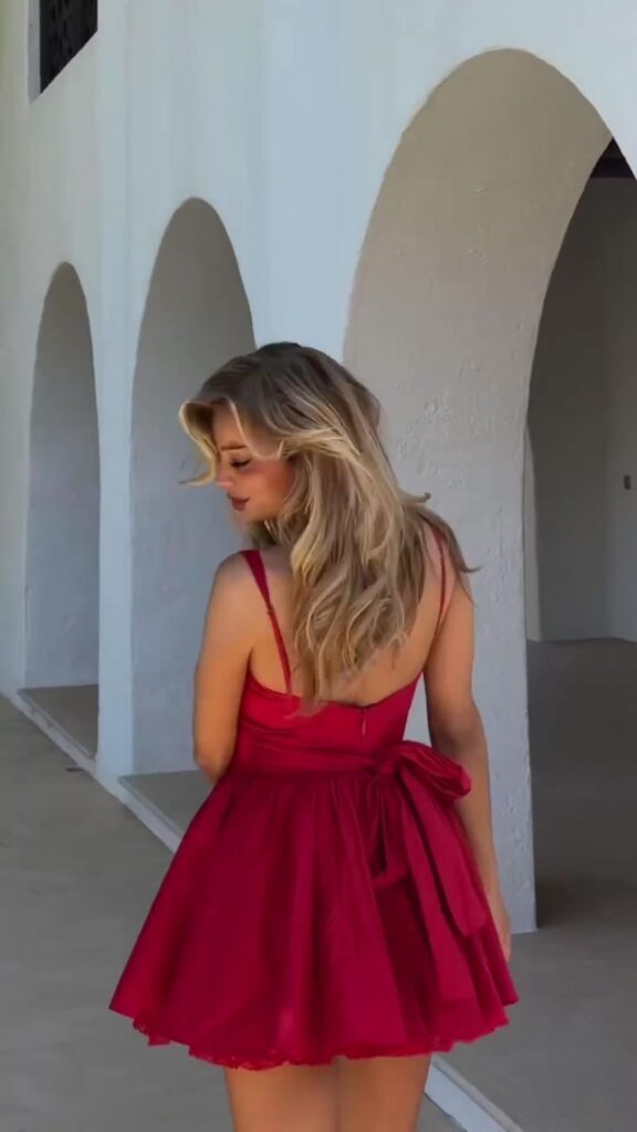 Laura Celia Valk stunned in a red dress