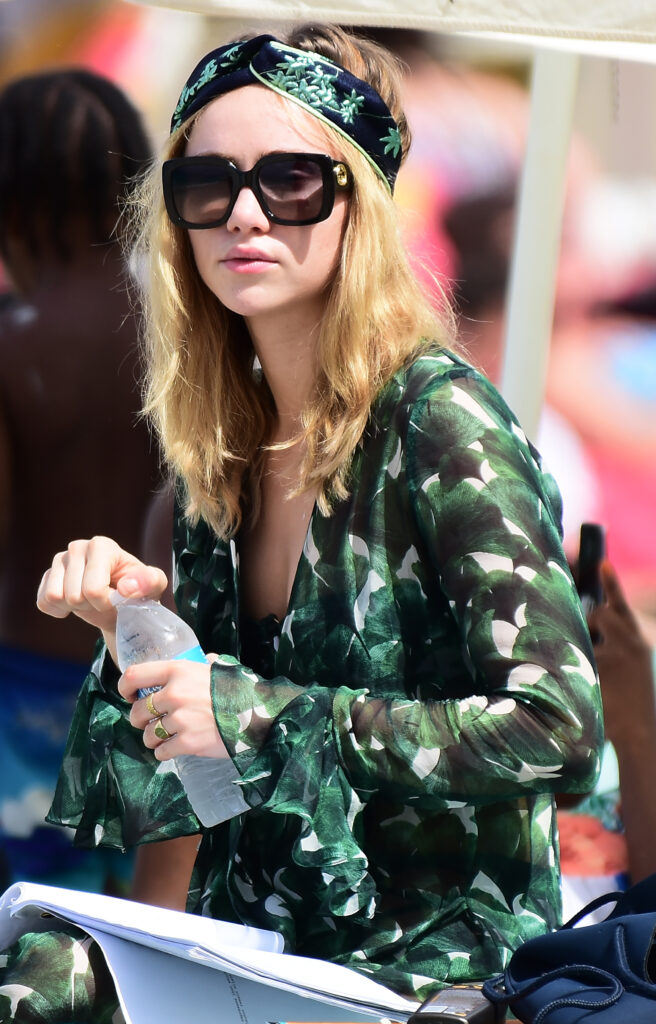 Suki Waterhouse photographed on a beach in Barbados in 2016