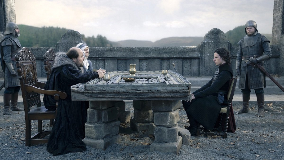 Lord and Lady Frey sit opposite Jace on The Twins' bridge on House of the Dragon