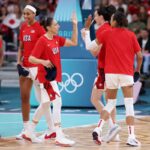 Diana Taurasi #12 of Team United States high fives teammates before the Women's Group Phase - Group B game between Japan and the United States on day three of the Olympic Games Paris 2024 at Stade Pierre Mauroy on July 29, 2024, in Lille, France. (Photo by Gregory Shamus/Getty Images)
