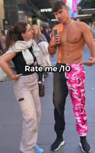 An influencer pulled a woman on the street to ask her to rate him out of 10