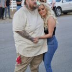 Jelly Roll and his wife Bunnie Xo sharing a sweet moment in a new Instagram photo