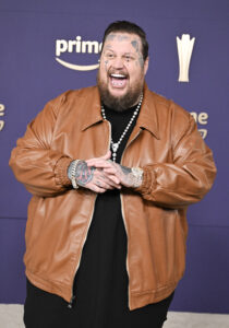 Jelly Roll smiling on the red carpet at the 59th Academy of Country Music Awards in May