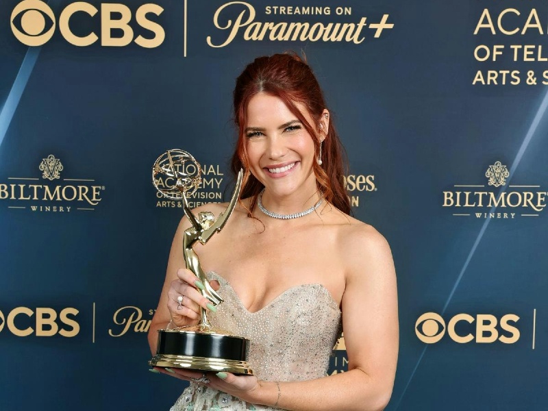 Courtney Hope holding her 2024 Daytime Emmy Award