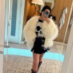 Kourtney Kardashian showing off her outfit ahead of her husband Travis Barker's concert with his band, Blink-182