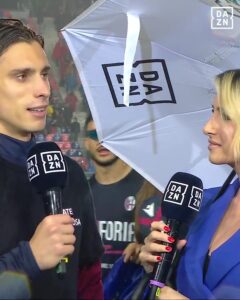 Riccardo Calafiori was interviewed by a female reporter after Bologna secured a Champions League spot