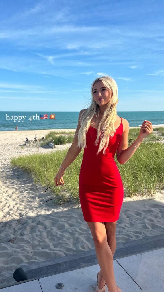 Olivia Dunne strikes a pose at the beach for Fourth of July.