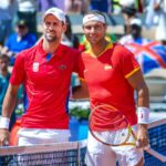 PARIS, FRANCE: JULY 29:  Novak Djokovic of Serbia and Rafael Nadal of Spain pose for a photograph at the net before their second round match of the Mens Singles Competition during the Paris 2024 Summer Olympic Games on July 29th, 2024 in Paris, France. (Photo by Tim Clayton/Corbis via Getty Images)
