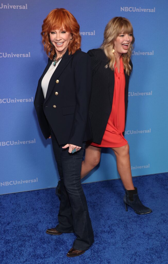 Reba McEntire reunited with Melissa Peterman at the 2024 NBCUniversal Summer Press Tour on July 14, looking sharp in a black blazer and dark jeans