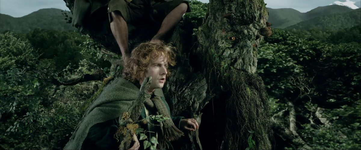 Merry rides on Treebeard’s leafy shoulder in The Lord of the Rings: The Two Towers. 