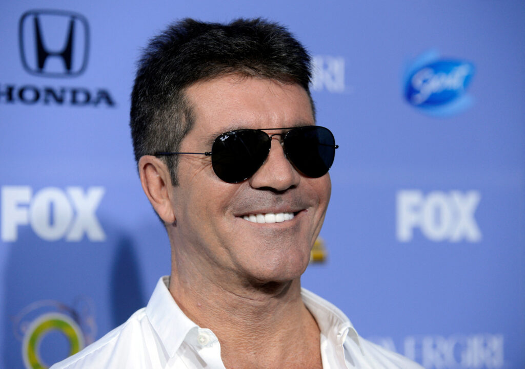 Simon Cowell reckons the pop industry is in crisis because so many people are trying to make it big through social media