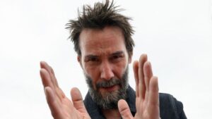 keanu reeves looking into the camera