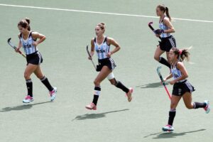 Luciana Aymar (2nd L) of Argentina celebrates her goal with her teammates during the Field Hockey World Cup women's tournament match between the USA and Argentina in The Hague, the Netherlands, on June 14, 2014.