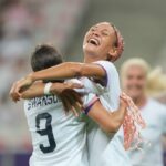 Trinity Rodman, #5 of the United States, celebrates scoring with Mallory Swanson #9 during the first half of the Women's group B match between the United States and Zambia during the Olympic Games Paris 2024 at Stade de Nice on July 25, 2024, in Nice, France.