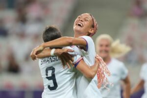 Trinity Rodman, #5 of the United States, celebrates scoring with Mallory Swanson #9 during the first half of the Women's group B match between the United States and Zambia during the Olympic Games Paris 2024 at Stade de Nice on July 25, 2024, in Nice, France.