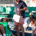 Zac Efron boarded a St. Tropez yacht with friends, carrying a designer store bag