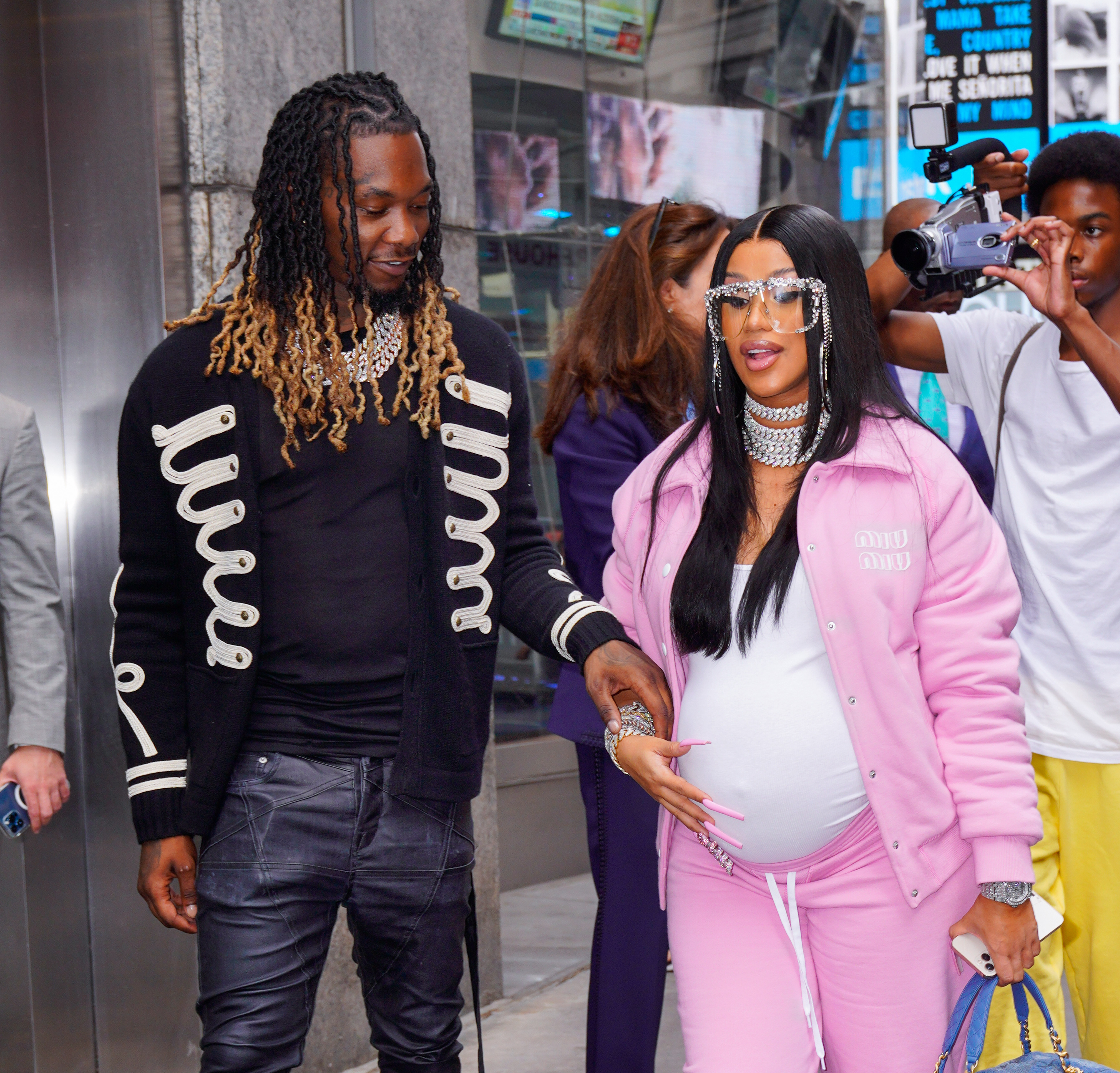 Cardi B, seen here with Offset and a baby bump in 2021, originally filed for divorce in 2020, when the Migos rapper was accused of cheating, but dropped the filing