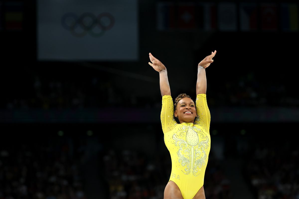 Rebeca Andrade of Team Brazil reacts after finishing her routine on the balance beam during the Artistic Gymnastics Women's All-Around Final on day six of the Olympic Games Paris 2024 at Bercy Arena on August 01, 2024 in Paris, France. (Photo by Ezra Shaw/Getty Images)