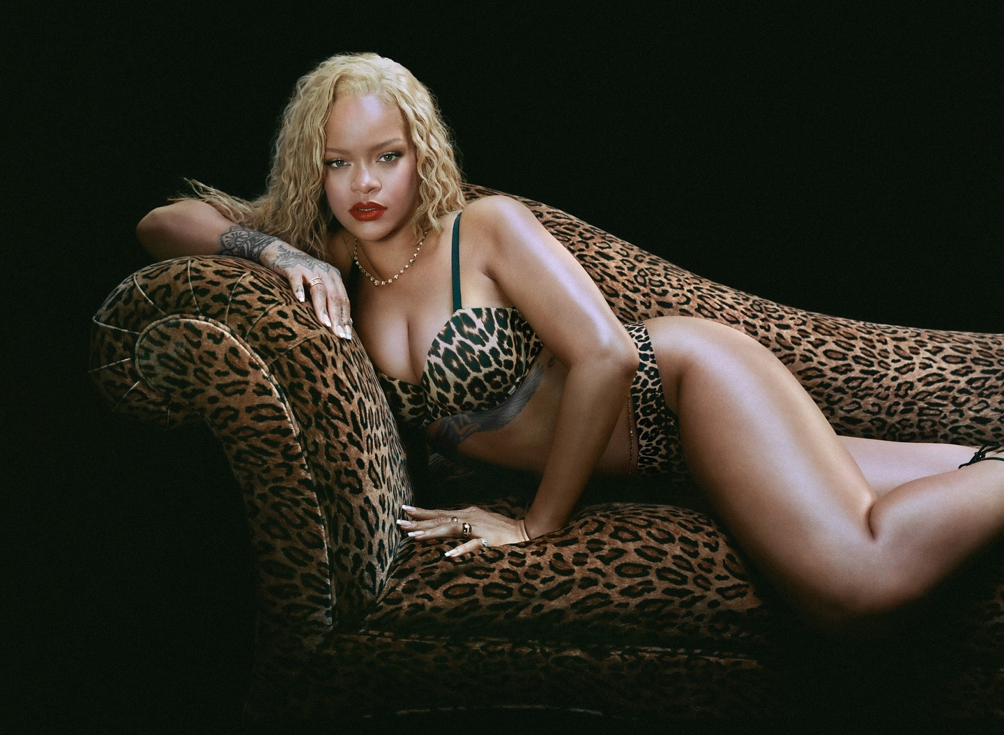 Rihanna sporting a matching leopard print bra and underwear for her new Soft N' Savage collection