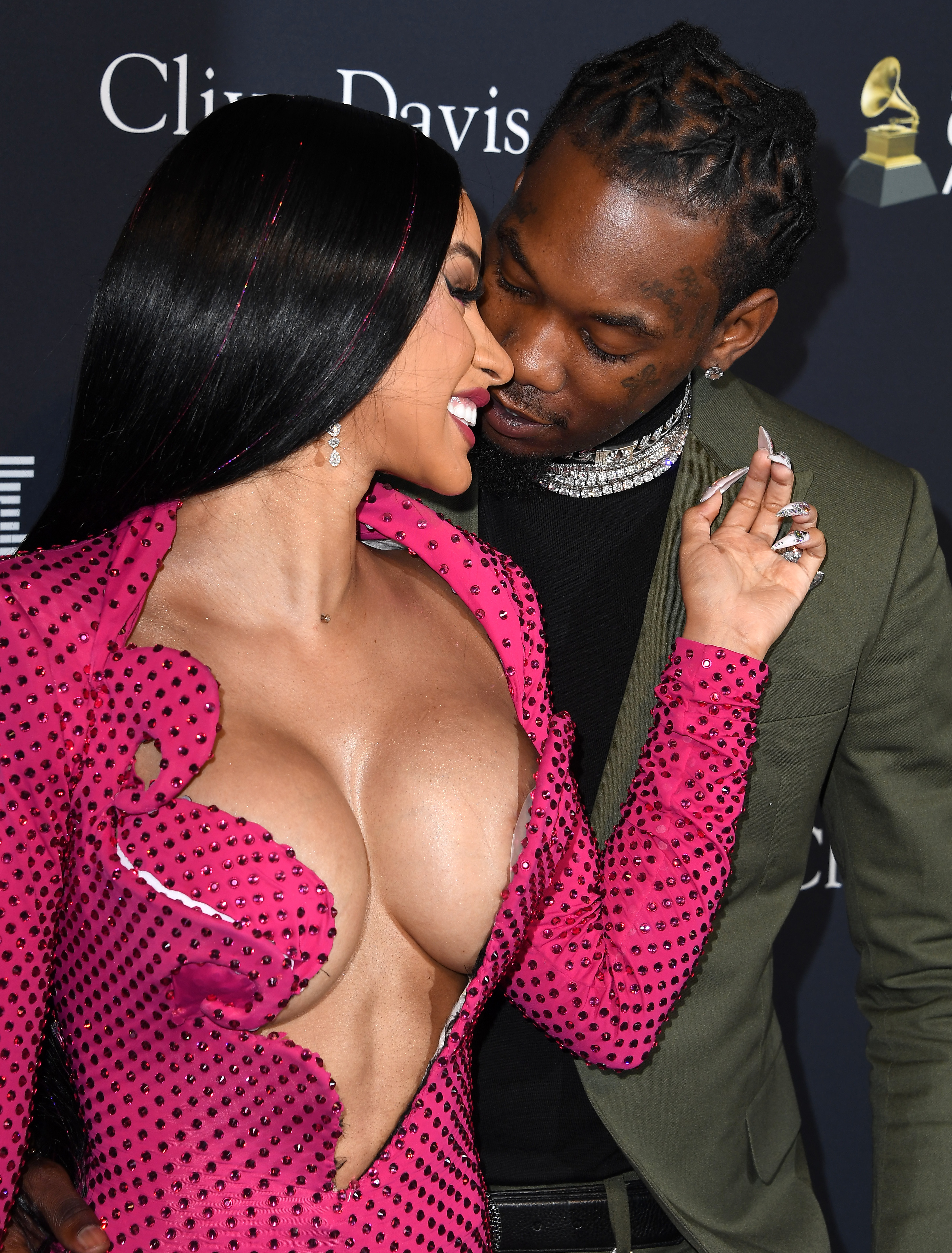 Cardi B and Offset sharing an intimate moment at the Pre-Grammy Gala in Beverly Hills in January 2020