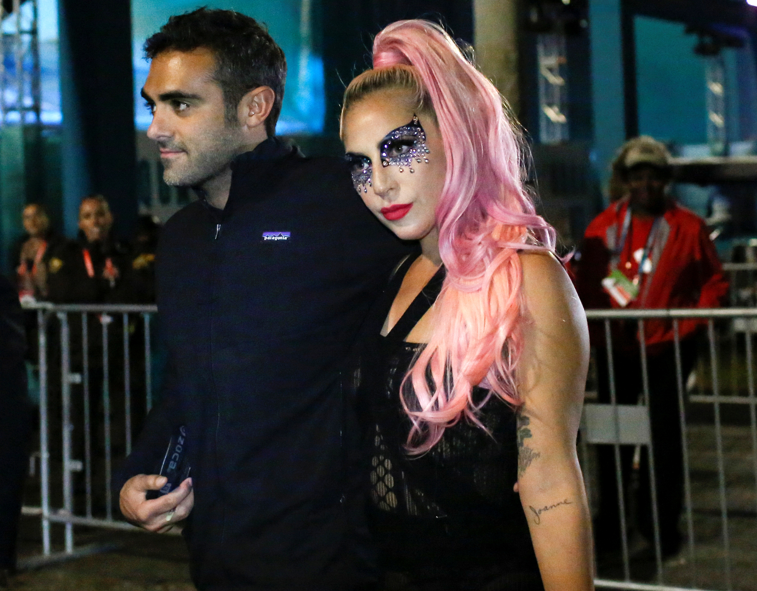Lady Gaga and Michael Polansky attend Super Bowl LIV together at the Hard Rock Stadium in Miami, Florida, on February 2, 2020