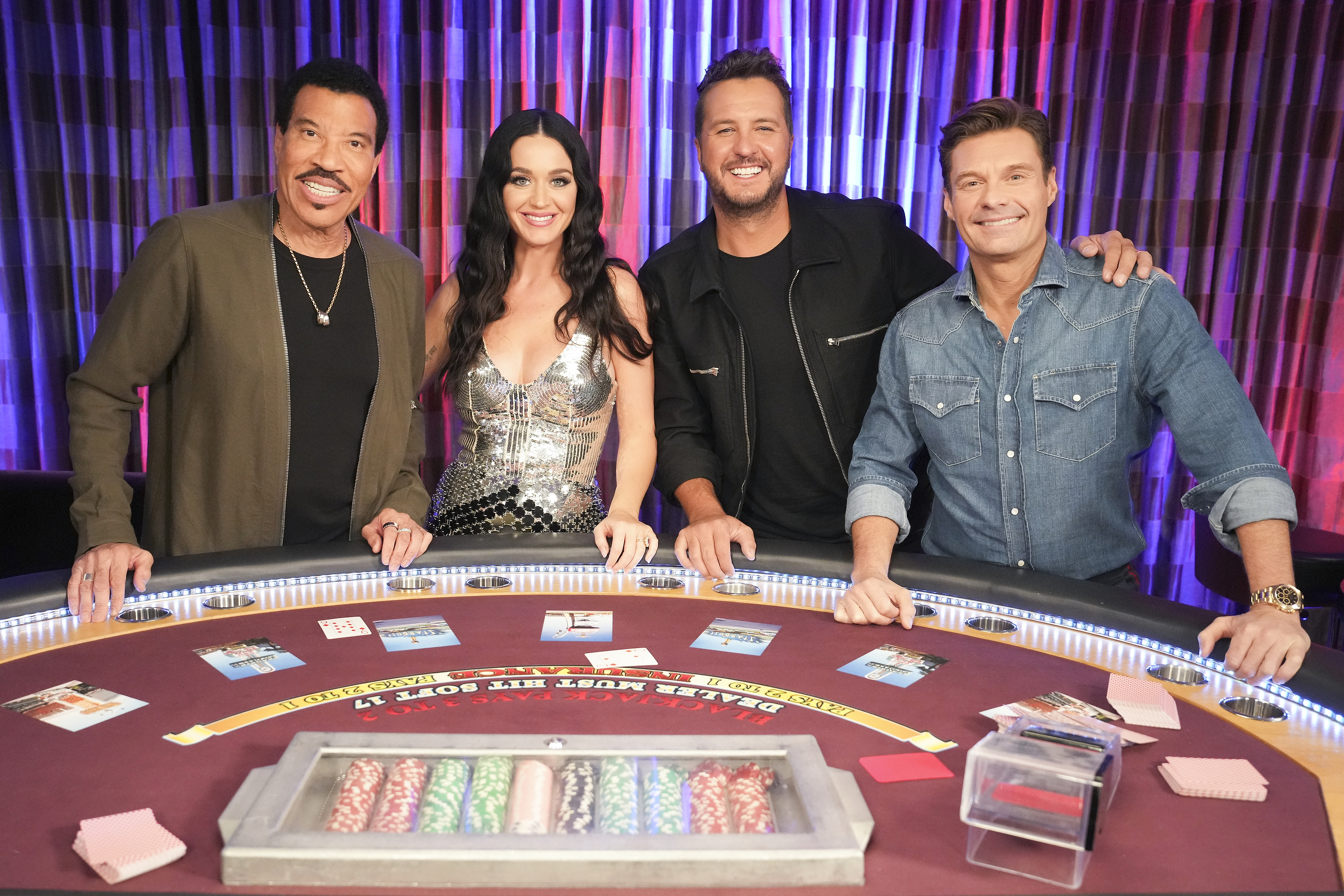 Luke Bryan pictured with Lionel Richie, Katy Perry, and Ryan Seacrest