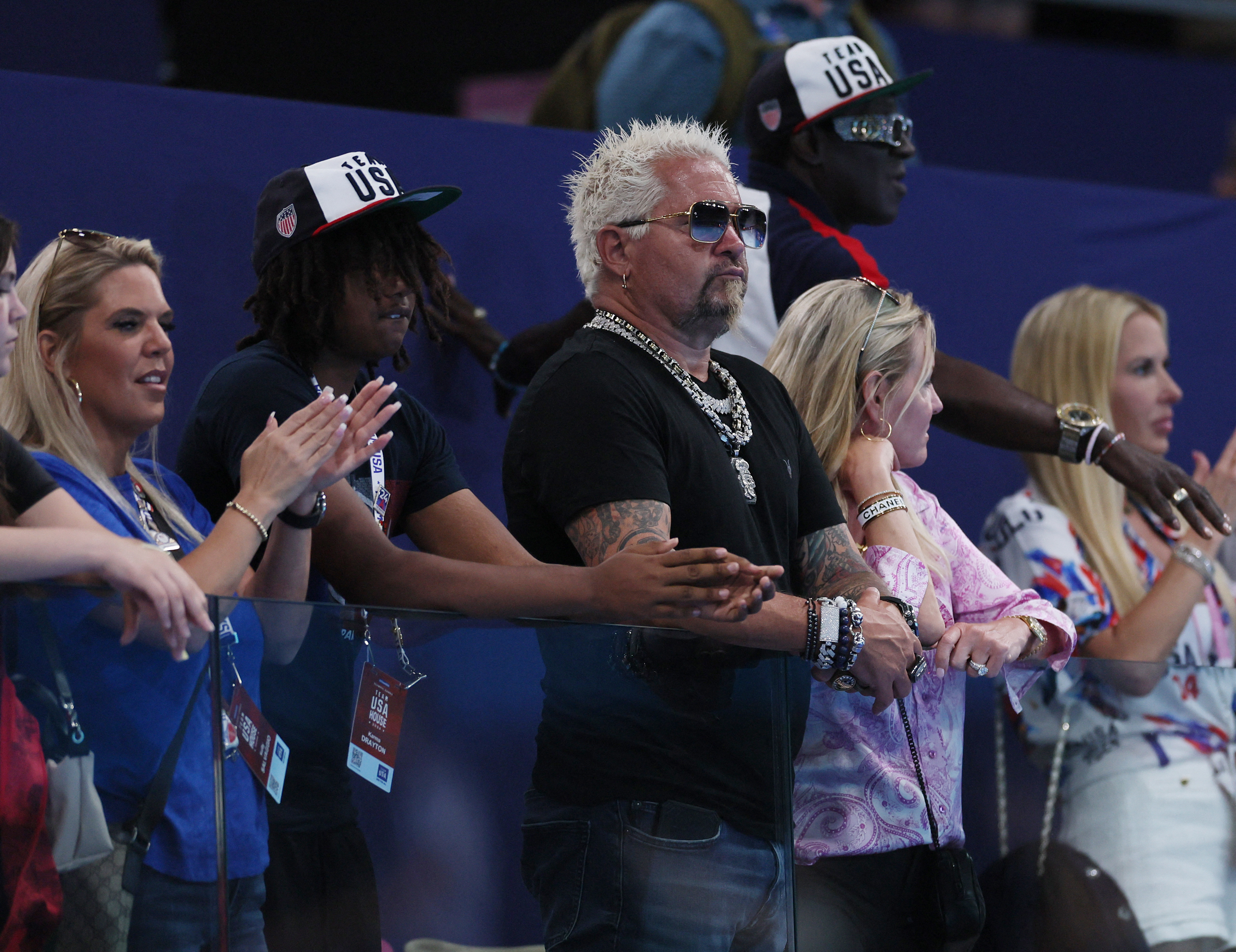 Flavor Flav and Guy Fieir cheering the U.S. team in their matchup against France at the 2024 Summer Olympics