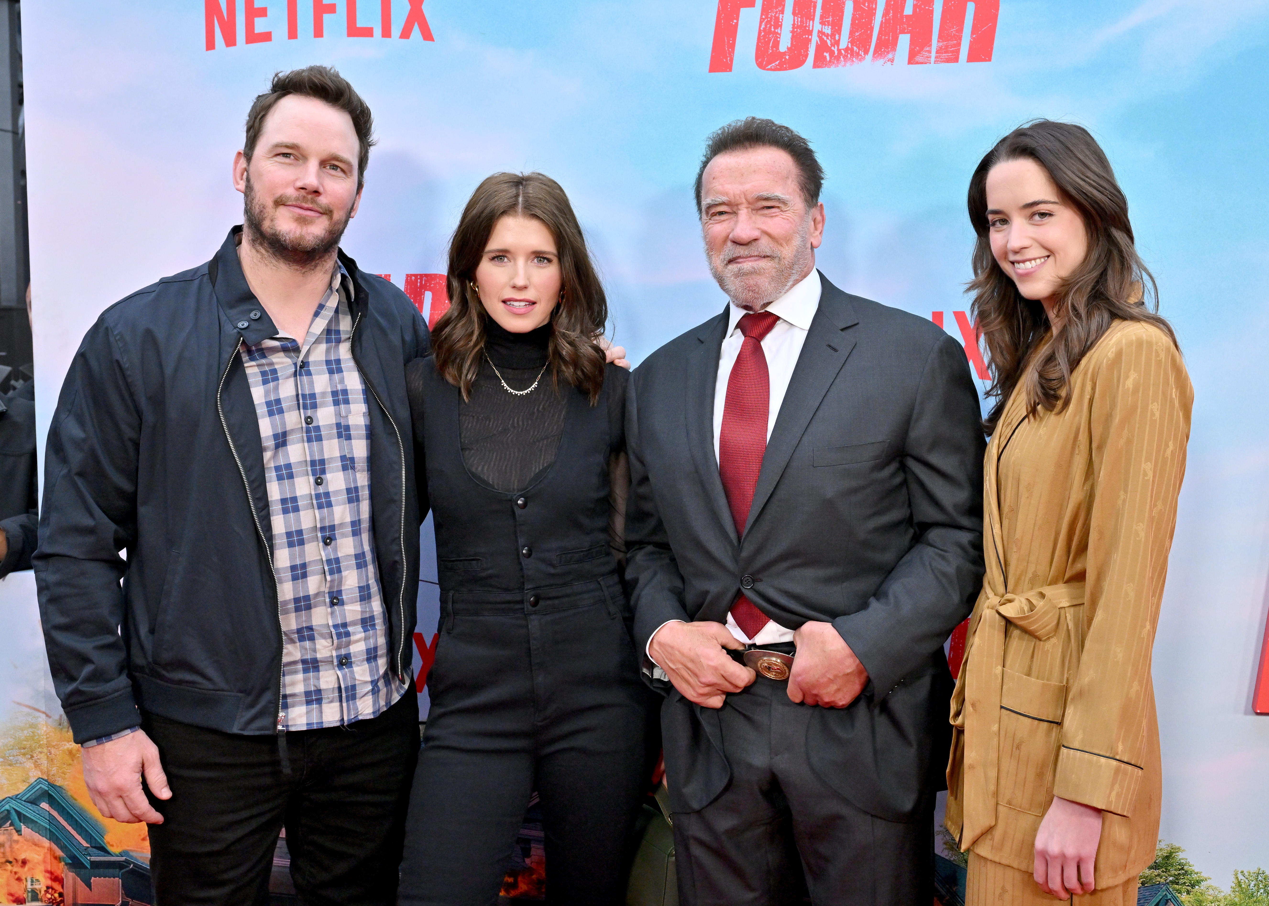 Chris Pratt, Katherine Schwarzenegger, Arnold Schwarzenegger, and Christina Schwarzenegger attend the Los Angeles Premiere of Fubar in 2023