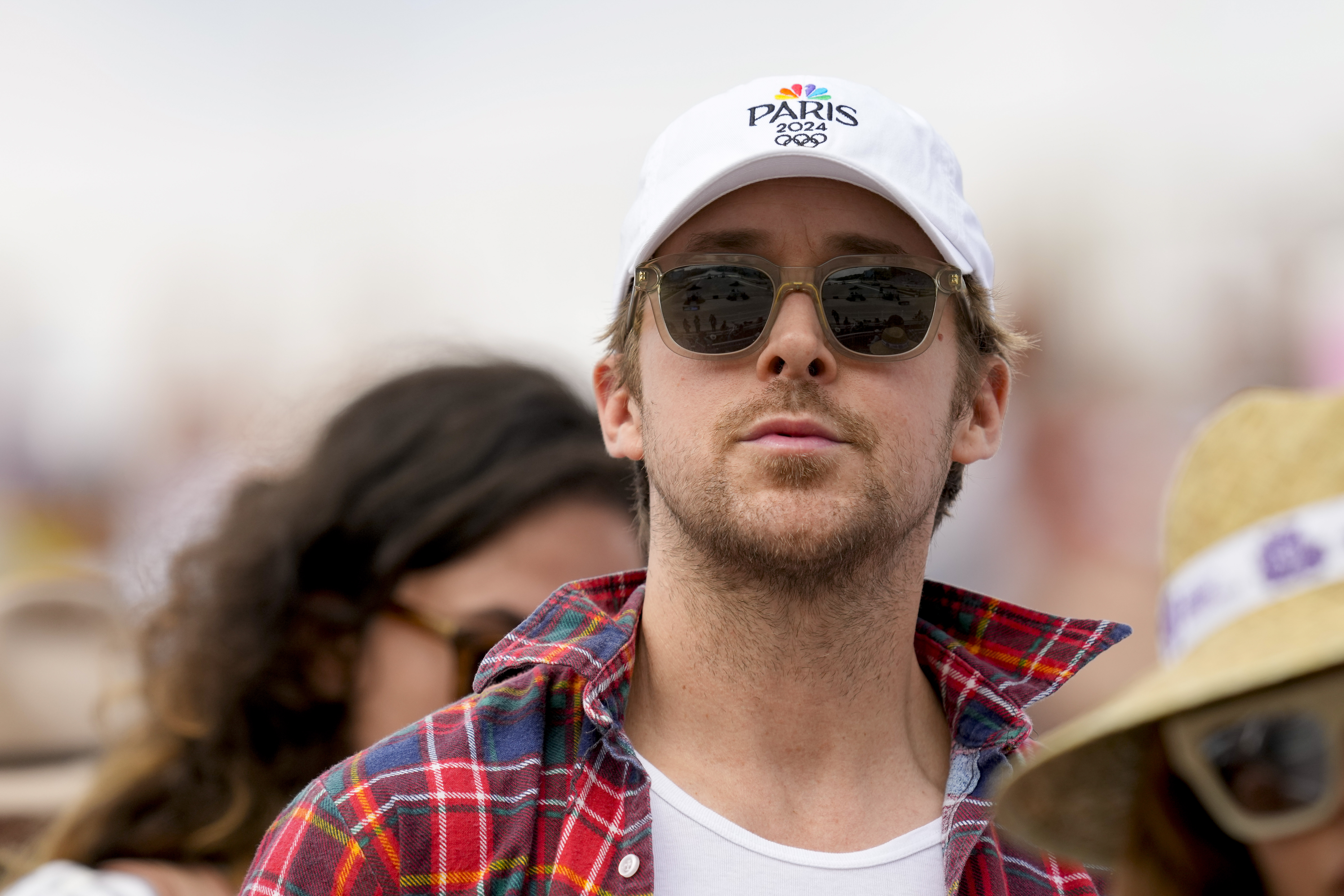 Ryan Gosling sported a white Paris Olympics hat during the Equestrian event