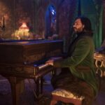 A man in a gothic house plays the piano in "What We Do in the Shadows."