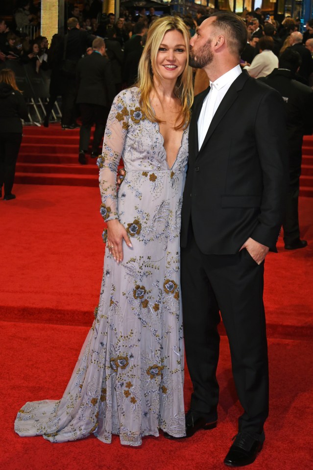 Julia Stiles (L) and Preston Cook at the 70th EE British Academy Film Awards (BAFTA) at Royal Albert Hall on February 12, 2017 in London