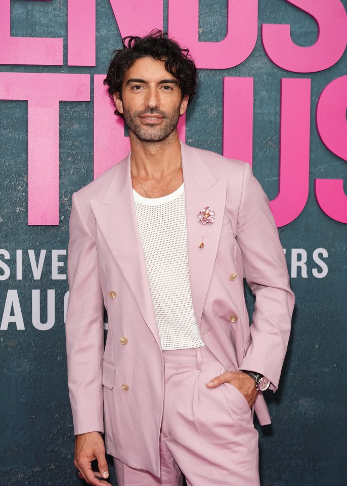 Justin Baldoni posed by himself at the premiere, after rumors of tension between the cast