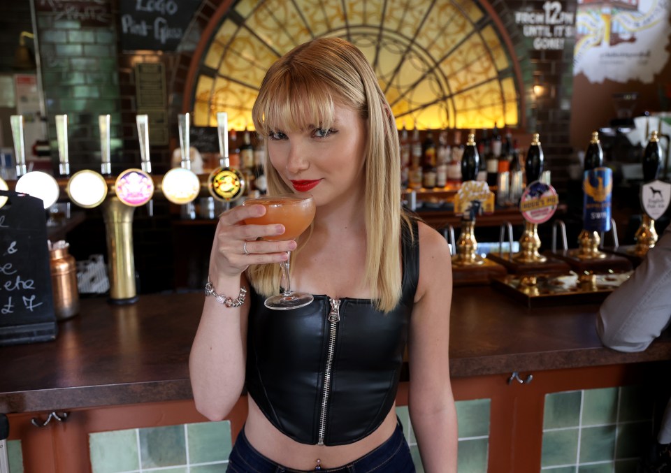 The lookalike sipping a cocktail at the Black Dog pub, in London, which has been mentioned on album The Tortured Poets Department