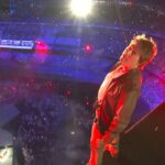 Tom Cruise standing on top of the Stade de Paris during the 2024 Summer Olympics closing ceremony